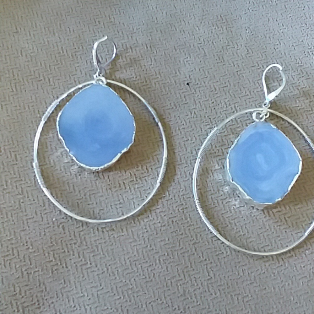 Long hoop earrings with stone centers